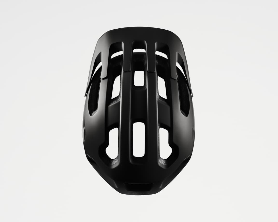 Black bicycle helmet with elongated ventilation slots, viewed from above against a plain white background.